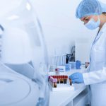 Woman collecting blood samples for testing on different diseases