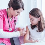 Nurse giving an injection